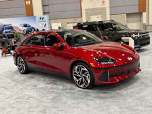 Red Hyundai car at an auto show.