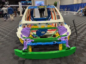 Colorful car frame displayed at event.