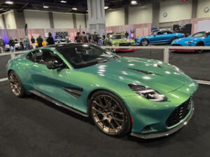 Luxury sports car at an auto show.