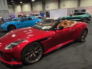 Red convertible sports car on display.